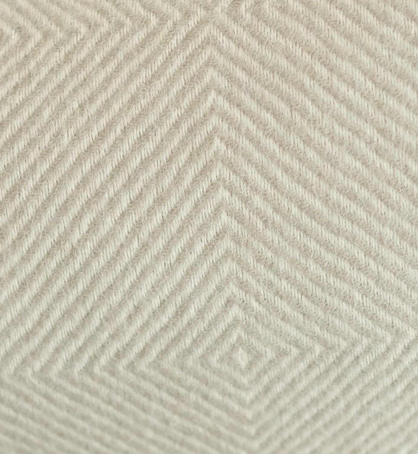 Textured fabric pattern with a geometric design on a light gray background