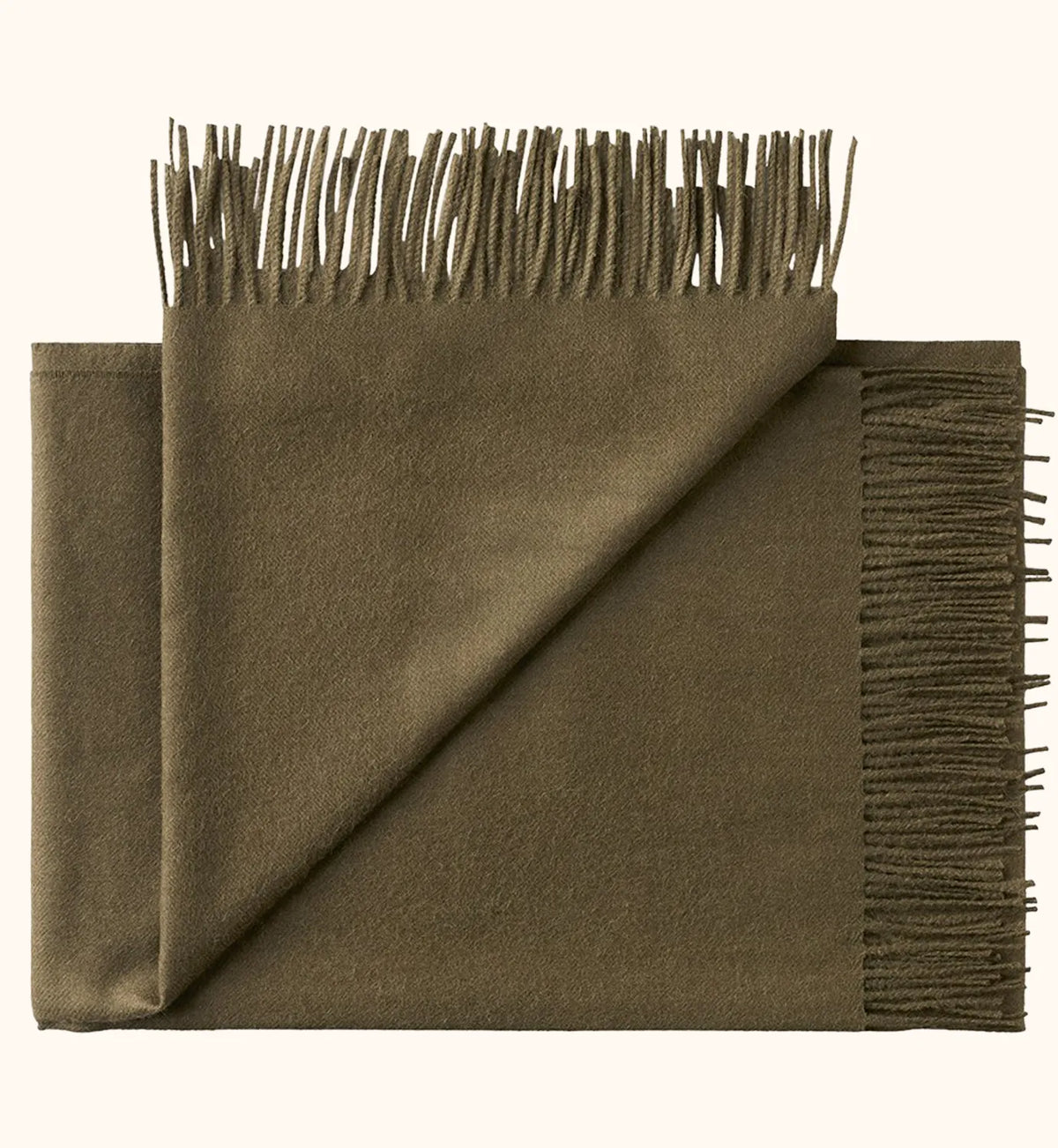 An olive brown woolen scarf with fringed edges, folded neatly on a light cream background.