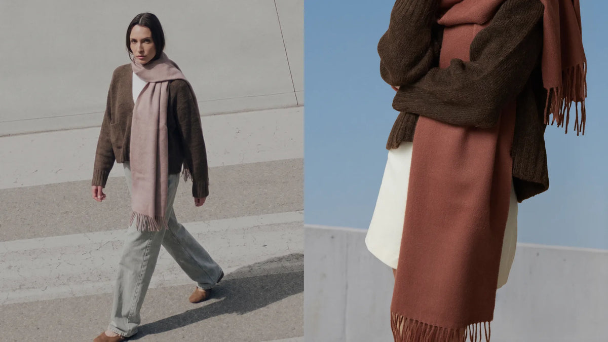 A split-panel lifestyle image showing a model wearing a brown knit cardigan, light gray wide-leg jeans, and a dusty pink scarf, alongside a close-up of the scarf's rust-brown color and fringe detail.